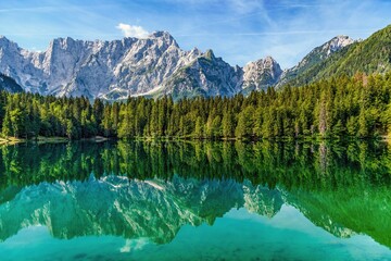Obraz na płótnie Canvas Beautiful shot of a lake in Laghi di Fusine in Julian alps, Italy