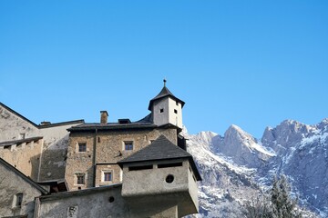 Fototapeta premium Blue sky over Hohenwerfen castle and fortress at Werfen in Austria