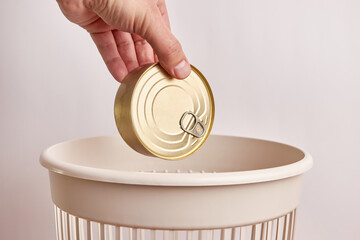 Expired food preservation is thrown into the trash. Disposal and recycling of food products.