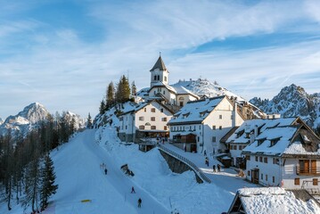 Naklejka premium Scenic view of mountaintop village of Monte Lussari in Julian alps in Italy