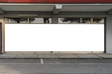 Long white commercial banner fixed on showcase of store outdoor. Advertising and promotion concept. © Bonsales