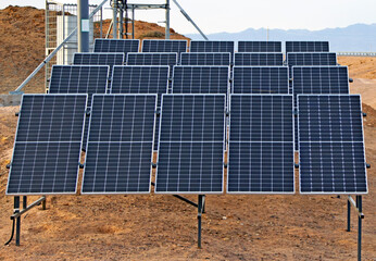 Solar panels in the desert steppe canyon, solar panels in the desert on a sunny day.