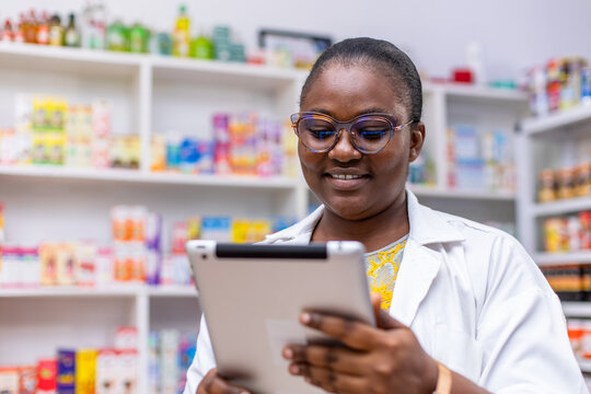 Telehealth, Black African Female  Pharmacist Video Calling Remote Patient with Smart Tablet, prescribes medicine dosage from drugs store.