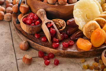 Tu Bishvat celebration concept. Mix of dry fruits and nuts almonds, hazelnuts, walnuts, apricots,...