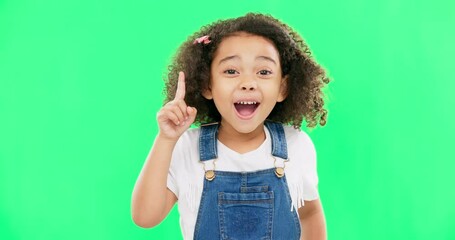 Idea, thinking and child pointing up at mockup space or green screen isolated against a studio background. Portrait, cute and smart, clever and intelligent kid or young person for brand placement