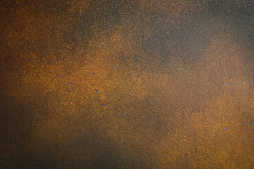 Dark brown grunge background with rust imitation. Free space for text. Top view.