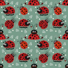 Seamless pattern with ladybirds on green background 