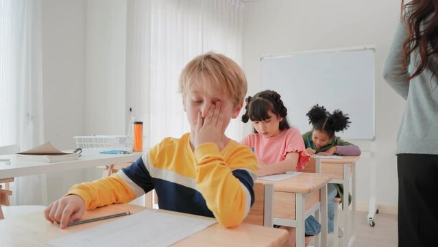 Elementary school students are stressing about doing their final exams in the exam room at school