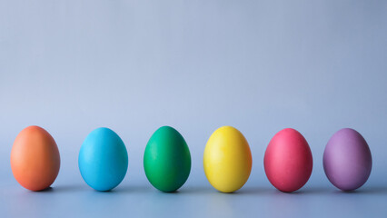 Row of colorful Easter eggs with a place for text