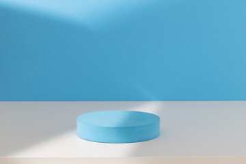 Round cylinder podium for products or cosmetics against light blue background with leaves shadows.	
