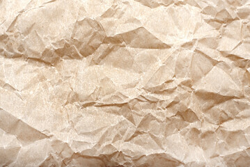 Texture of crumpled baking paper. Background from old retro paper