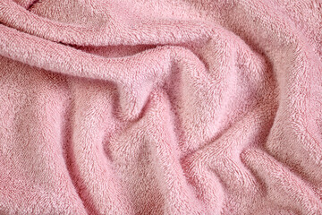 Fototapeta na wymiar Abstract background terry texture pink towel closeup