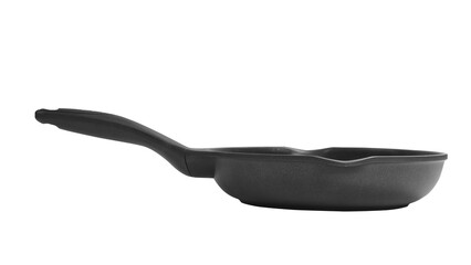 Black frying pan on the table side view. Isolated png with transparency