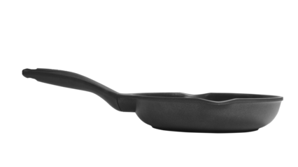 Black frying pan on the table side view. Isolated png with transparency