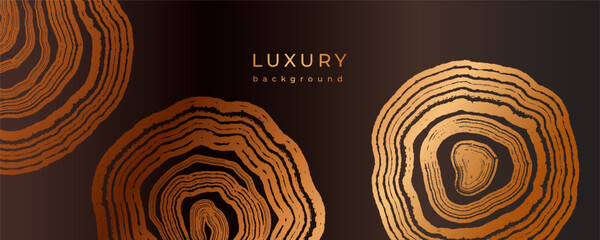 Luxury golden background with wood annual rings texture. Banner with shiny tree ring pattern. Stamp of tree trunk in section. Natural wooden concentric circles. Black and bronze gold background
