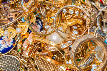 Close-up Of A Large Pile of Golden Jewelry Items