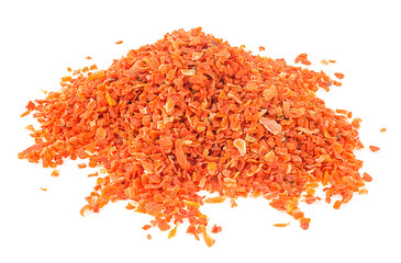 Pile of dried chopped carrots isolated on a white background. Grinded dried carrot.