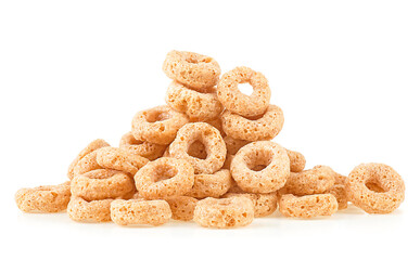 Pile of oat cereal rings isolated on a white background. Whole grain oat cereals.
