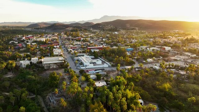 Old mexican town shot from a drone above view of the town in beautiful morning light. Todos Santos, san jose del cabo and cabo san lucas small towns. 