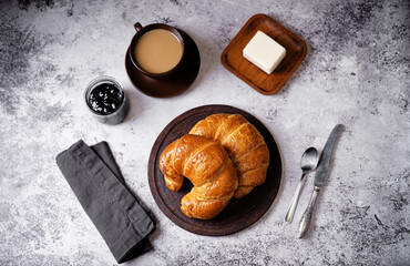 Fresh croissants in a plate for breakfast