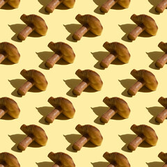 Seamless pattern with marinated mushroom on yellow background.