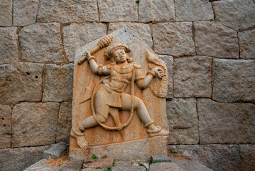 Statue of Bhima at one of the gates of the fortifications in Hampi