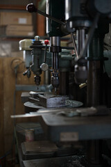 Part machining with drilling machine