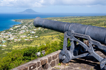 Cannon Brimstone Hill Fort, St. Kitts. Caribbean Sea background view.