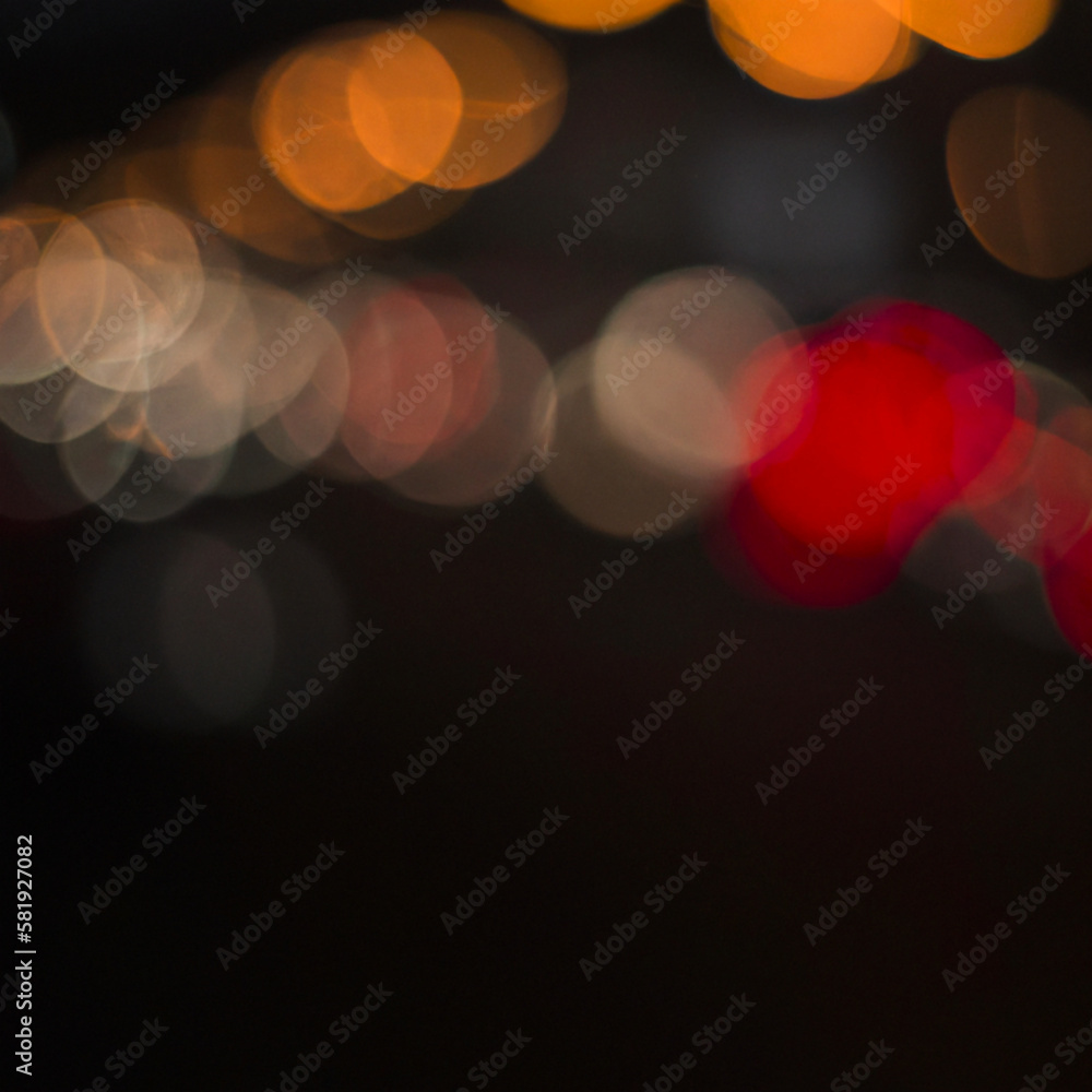 Poster multicolored abstract round bokeh - beige, orange, gray, red. bokeh is the blurring of an out-of-foc