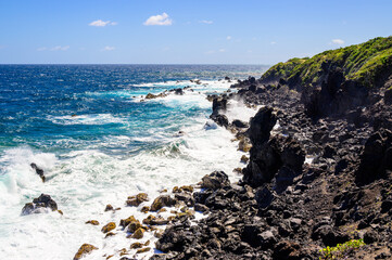 A view along the lava rock formations at Black Rocks on the Atlantic coast of in St Kitts