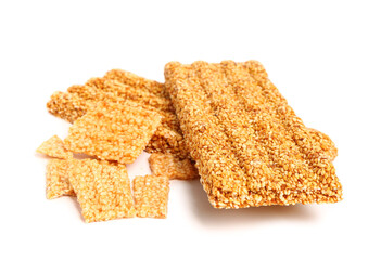 Sweet sesame kozinaki isolated on white background