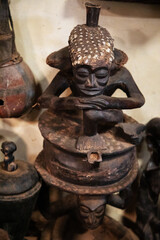 a large exhibition of African masks and figurines made of wood, handmade in the national style