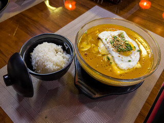The delicious Ramyon soup with rice in the small bowl.