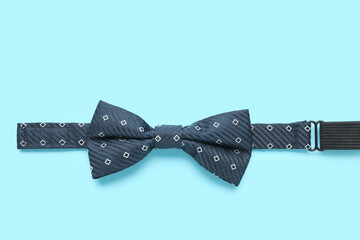 Male bow tie on color background