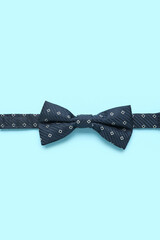 Male bow tie on color background