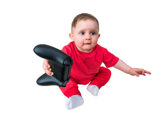 Baby girl in red suit with blck gamepad in hand isolated in white	
