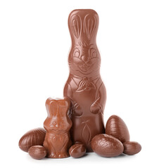 Chocolate Easter bunnies with eggs on white background