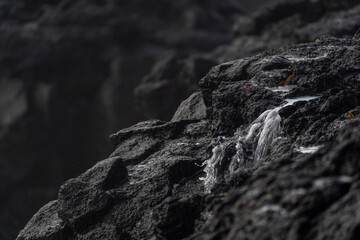 sea and beautiful black rocks the power of the ocean