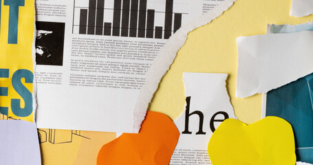 Image of pieces of paper and newspaper over yellow