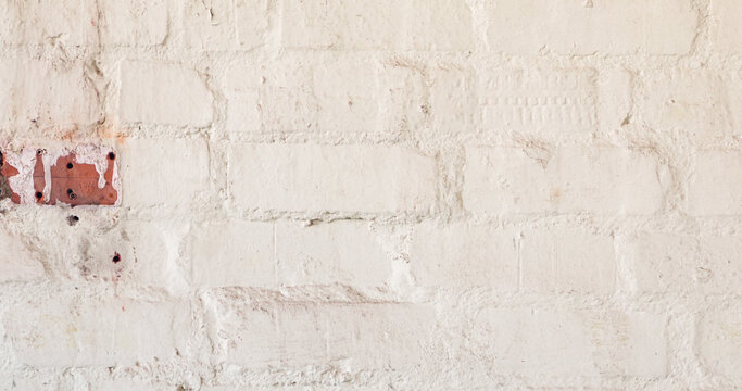 Image of close up of white painted brick wall