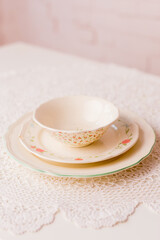 Closeup of porcelain plates and bowls