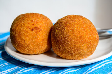 Traditional street food in UK, stuffed fried Scotch eggs with breadcrumbs