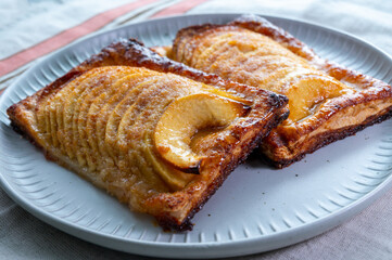 Tasty sweet French dessert, baked apple cake, Normandy region, France, close up