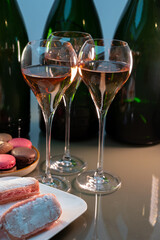 Tasting of rose brut Champagne sparkling wine in cellars of gran cru wine house in Epernay, wine tour in Champagne, France