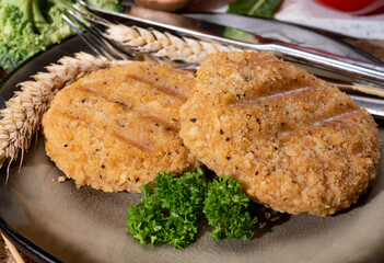 Source of fibre plant based vegan wheat protein grilled burgers, meat free healthy food close up
