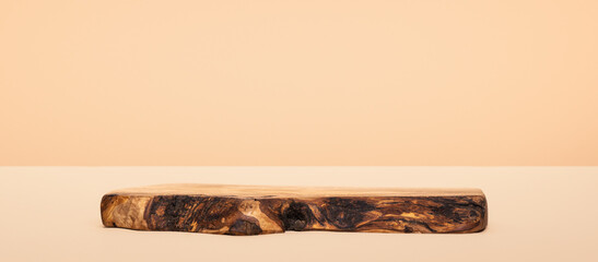 Background for products cosmetics, food or jewellery. Rustic wood pieces podium. Front view.	
