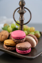 Macarons or French macaroon  sweet meringue-based confection made with egg white, icing sugar, granulated sugar, almond meal, and food colouring