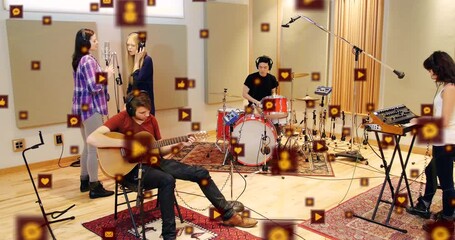 Animation of multiple icons over diverse musical band practicing in studio