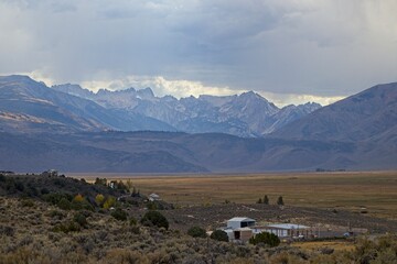 Sharp peaks rise over the Eastern Sierra, a region at the base of the steep eastern side of the Sierra Nevadas, as seen from the Travertine Hot Springs.