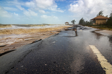 Fototapeta na wymiar Road damage caused by sea waves erode